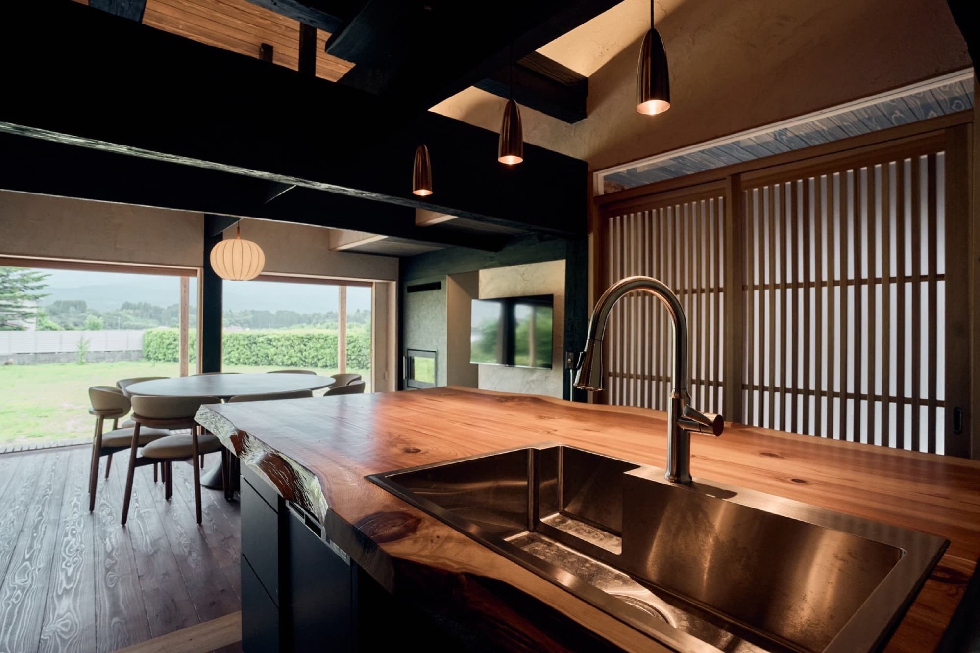 Live-edge cedar kitchen island facing the garden