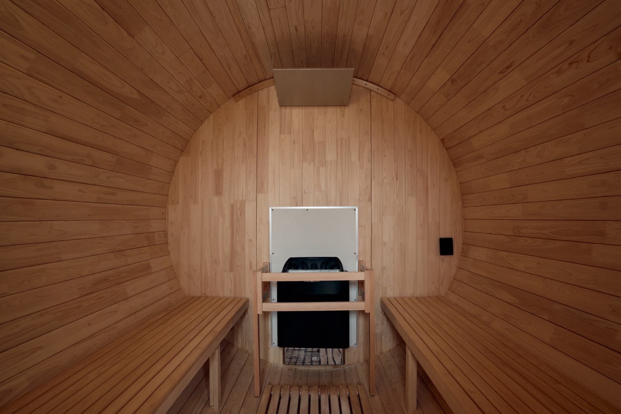 Inside the cedar barrel sauna